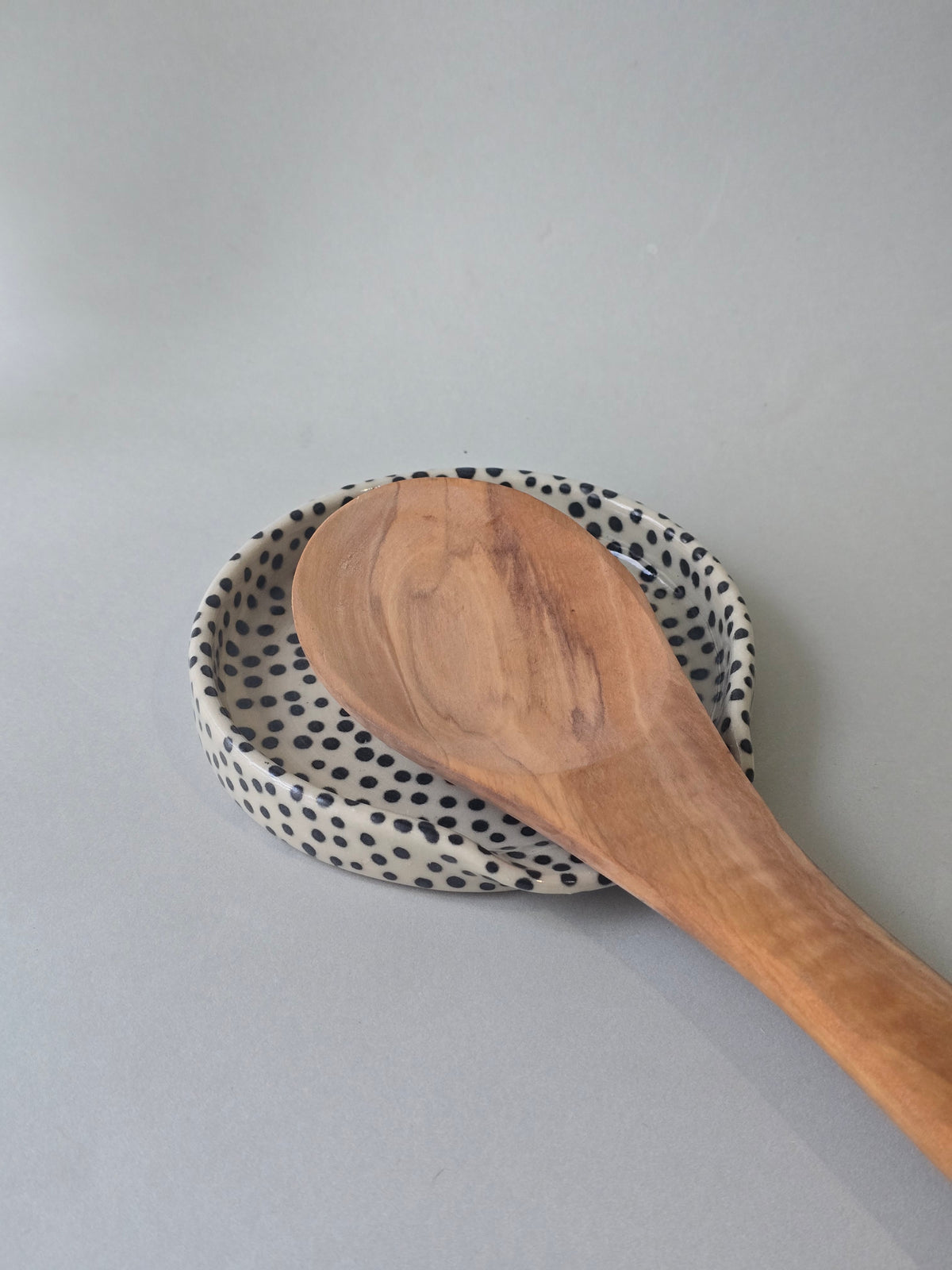 Spotty spoon rest